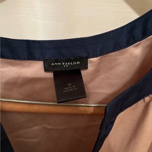 Beige with a blue colar line women medium shirt/blouse by Ann Taylor.